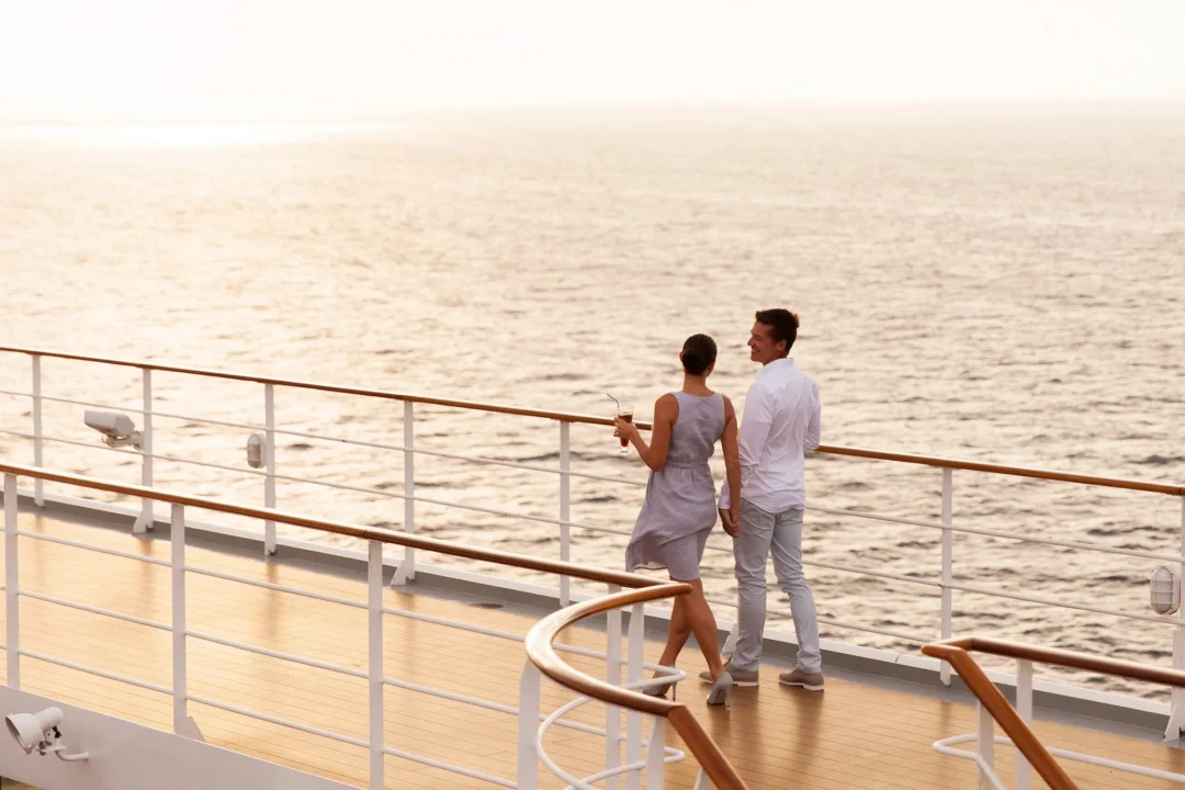 Couple walking on a terrace cruise