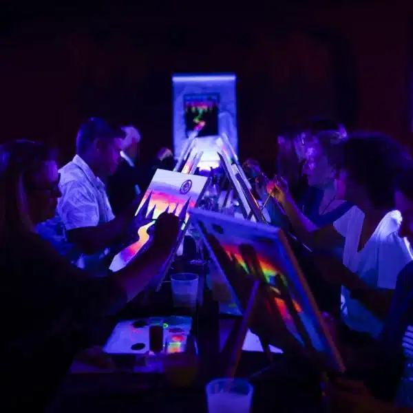 Looking for something different in Ibiza? Try this amazing fluorescent painting and wine workshop