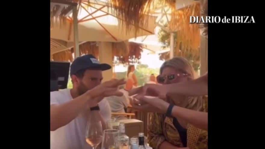 Jamie Dornan, surprised with a magic trick in an Ibiza beach bar
