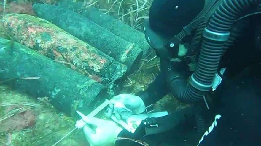 what are 13 artillery shells doing in the sea near the port of Ibiza?