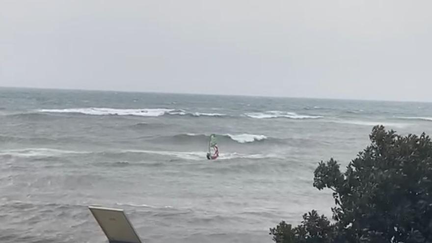 Windsurfer enjoying the bad weather