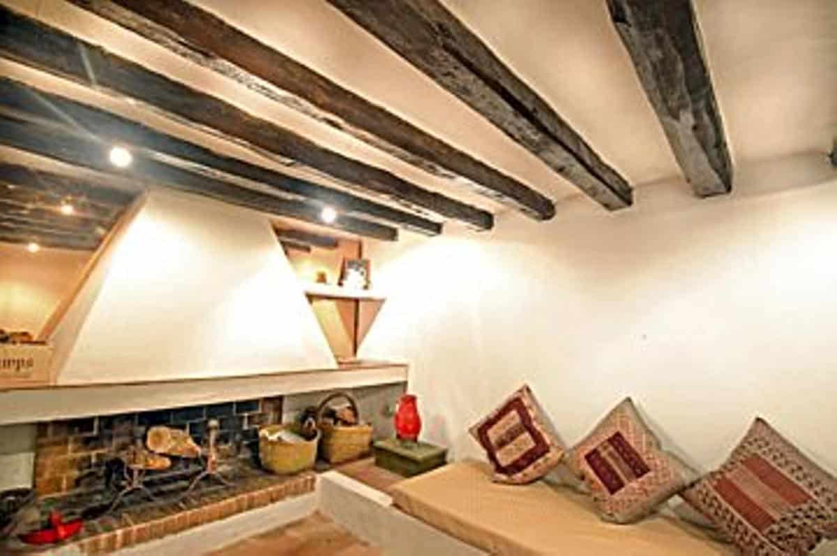 The living room has a fireplace